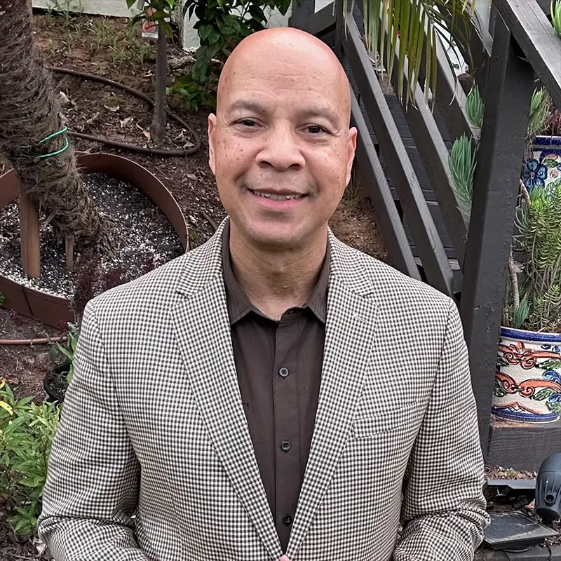 Smiling photo of Dwane Brown